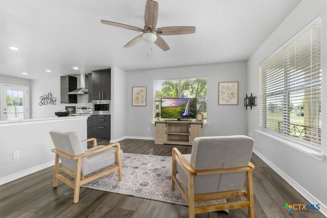 8606 Georgia Ave, Temple, TX 76502 - living area with recessed lighting, dark wood-style flooring, ceiling fan, and baseboards