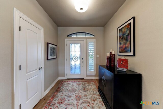 entrance foyer featuring light hardwood / wood-style floors