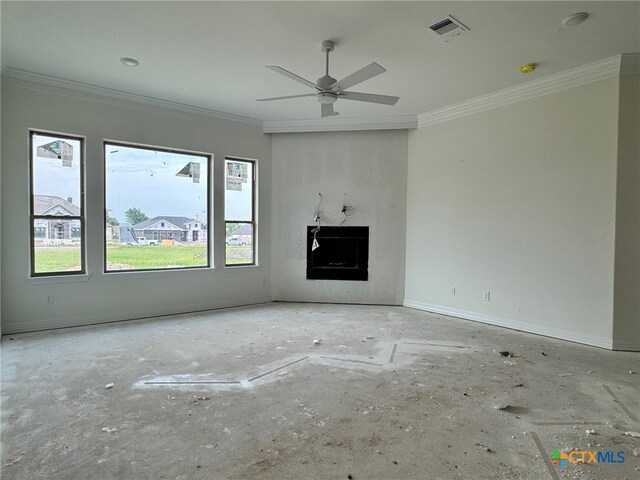 10818 Campsite Cv, Temple, TX 76502 - unfurnished living room with healthy amount of natural light, ornamental molding, baseboards, a ceiling fan, and a fireplace