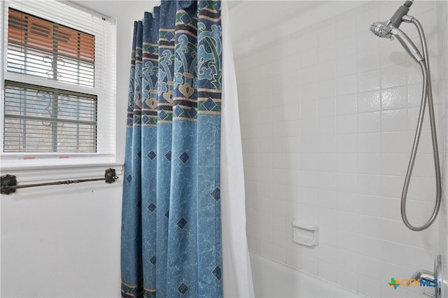 full bathroom featuring shower / bathtub combination with curtain