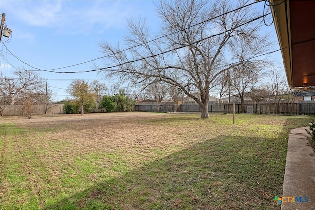 view of yard with fence