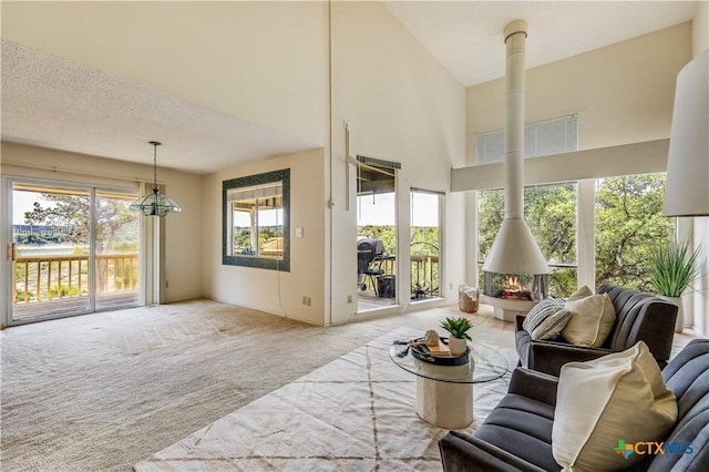 sunroom / solarium featuring vaulted ceiling