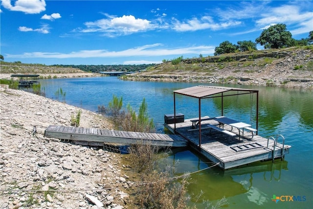 view of dock featuring a water view