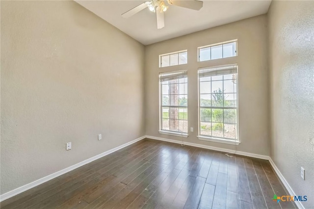 293 Reese Creek Rd, Killeen, TX 76549 - unfurnished room with a textured wall, ceiling fan, baseboards, and dark wood finished floors