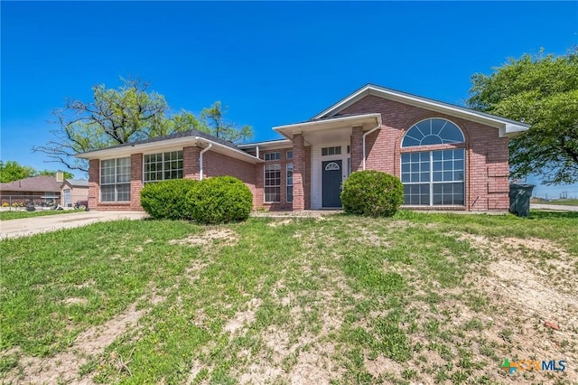 293 Reese Creek Rd, Killeen, TX 76549 - single story home with brick siding and a front lawn