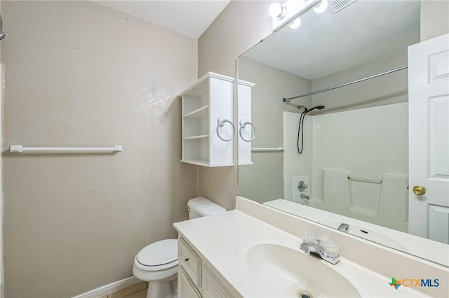 293 Reese Creek Rd, Killeen, TX 76549 - bathroom featuring a textured wall, vanity, baseboards, and toilet