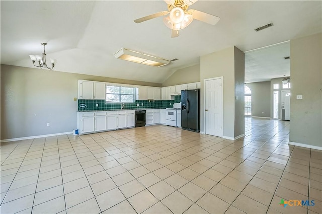 293 Reese Creek Rd, Killeen, TX 76549 - kitchen with tasteful backsplash, black appliances, visible vents, lofted ceiling, and a sink