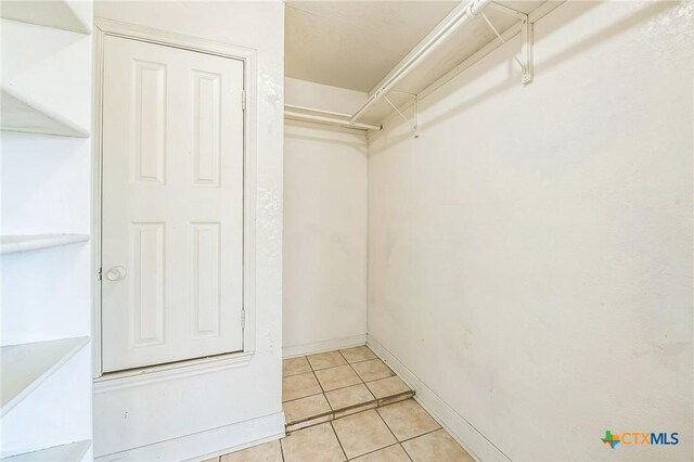 293 Reese Creek Rd, Killeen, TX 76549 - walk in closet with light tile patterned floors