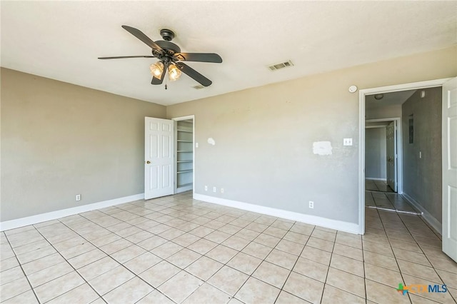 293 Reese Creek Rd, Killeen, TX 76549 - spare room featuring visible vents, baseboards, a ceiling fan, and light tile patterned flooring