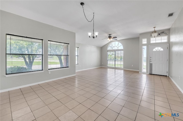 293 Reese Creek Rd, Killeen, TX 76549 - interior space with baseboards, light tile patterned flooring, visible vents, lofted ceiling, and ceiling fan with notable chandelier