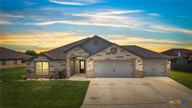 7511 Wind Chime Way, Temple, TX 76502 - french country style house with a garage, driveway, roof with shingles, stone siding, and brick siding