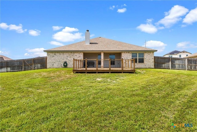7511 Wind Chime Way, Temple, TX 76502 - back of house with a fenced backyard, a wooden deck, a chimney, and brick siding