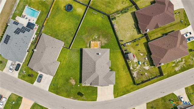 7511 Wind Chime Way, Temple, TX 76502 - aerial perspective of suburban area with a pool area