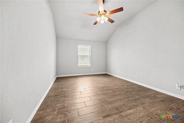 7511 Wind Chime Way, Temple, TX 76502 - unfurnished room featuring a ceiling fan, dark wood-type flooring, and lofted ceiling