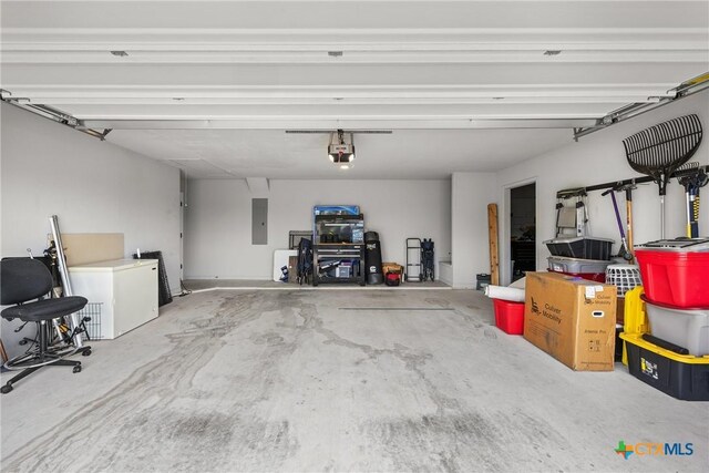 7511 Wind Chime Way, Temple, TX 76502 - garage with a garage door opener and electric panel