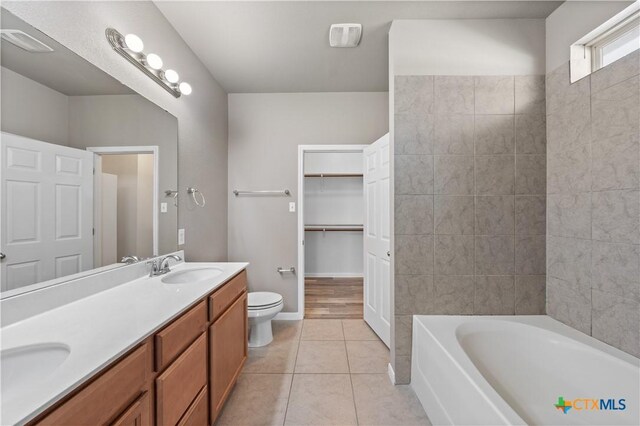 laundry area with washer hookup, electric dryer hookup, light tile patterned flooring, and hookup for a gas dryer