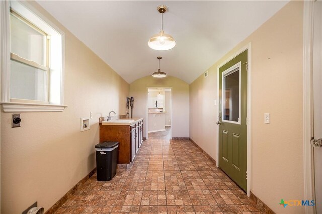 196 Garza Rd, Port Lavaca, TX 77979 - hallway with stone finish flooring and vaulted ceiling