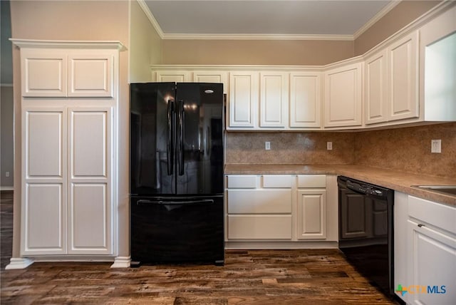 196 Garza Rd, Port Lavaca, TX 77979 - kitchen with black appliances, ornamental molding, white cabinetry, tasteful backsplash, and dark wood-style flooring