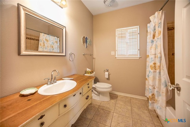 196 Garza Rd, Port Lavaca, TX 77979 - full bathroom with vanity, tile patterned floors, and shower / bath combination with curtain