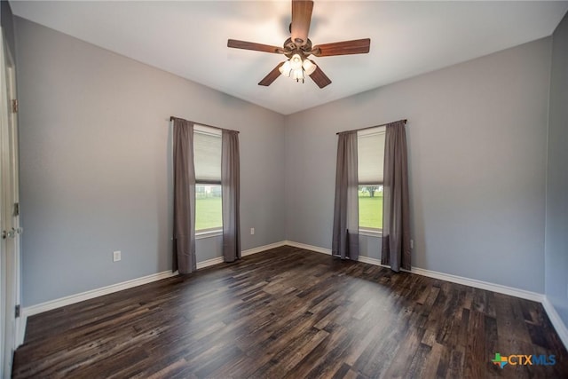 196 Garza Rd, Port Lavaca, TX 77979 - unfurnished room featuring dark wood-type flooring and a ceiling fan