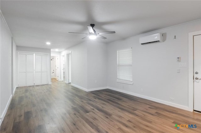 1445 Hillview Ave, New Braunfels, TX 78130 - unfurnished living room with an AC wall unit, ceiling fan, baseboards, dark wood finished floors, and recessed lighting