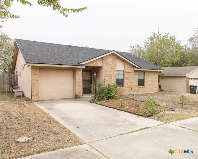 single story home with a garage