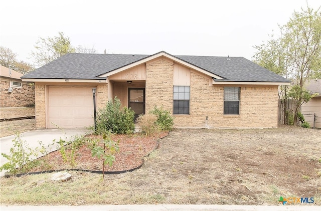 single story home with a garage