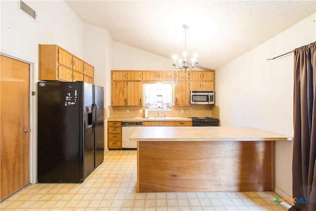 kitchen with lofted ceiling, black appliances, a chandelier, sink, and decorative light fixtures