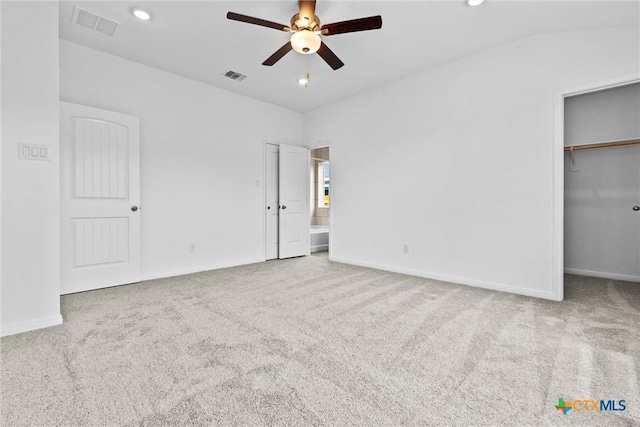 9820 Tarabon Dr, Killeen, TX 76542 - unfurnished bedroom with carpet, a spacious closet, a ceiling fan, and recessed lighting