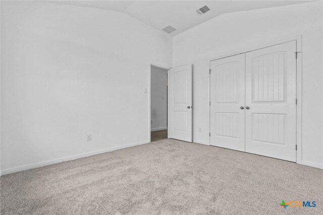 9820 Tarabon Dr, Killeen, TX 76542 - unfurnished bedroom featuring carpet floors, vaulted ceiling, and a closet
