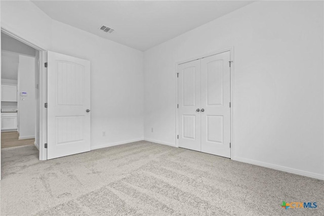 9820 Tarabon Dr, Killeen, TX 76542 - unfurnished bedroom featuring carpet flooring and a closet