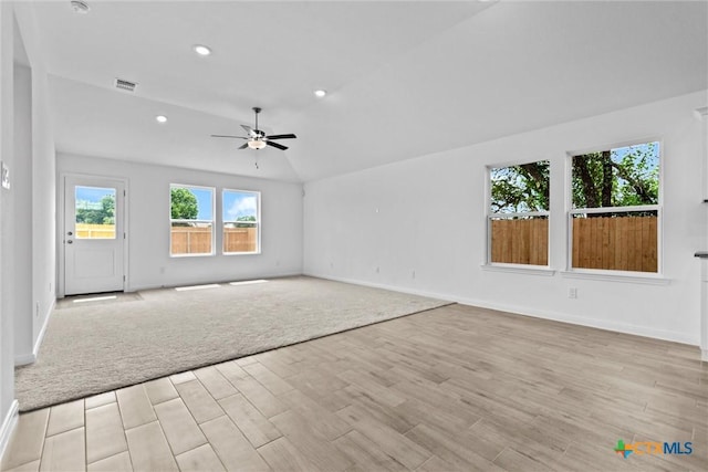 9820 Tarabon Dr, Killeen, TX 76542 - unfurnished living room featuring light wood-style floors, ceiling fan, recessed lighting, and vaulted ceiling