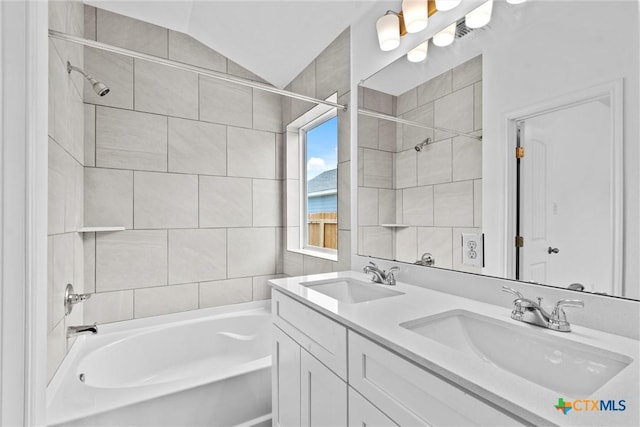 9820 Tarabon Dr, Killeen, TX 76542 - full bath featuring bathtub / shower combination, double vanity, and lofted ceiling