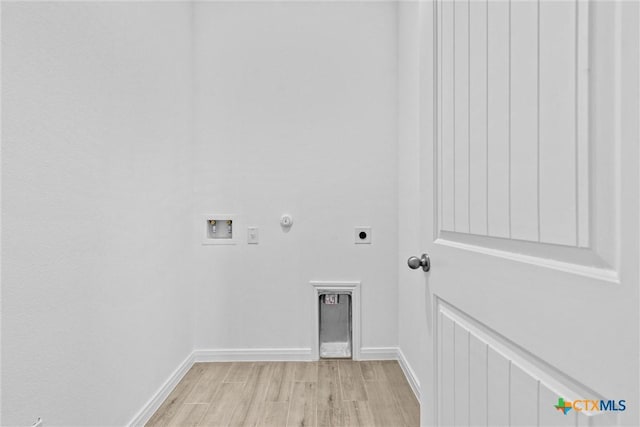 9820 Tarabon Dr, Killeen, TX 76542 - washroom featuring gas dryer hookup, hookup for an electric dryer, hookup for a washing machine, and light wood-style flooring