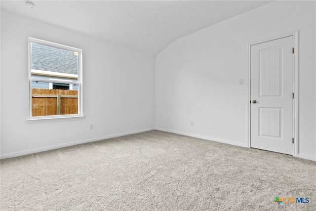 9820 Tarabon Dr, Killeen, TX 76542 - carpeted spare room with lofted ceiling and a smoke detector