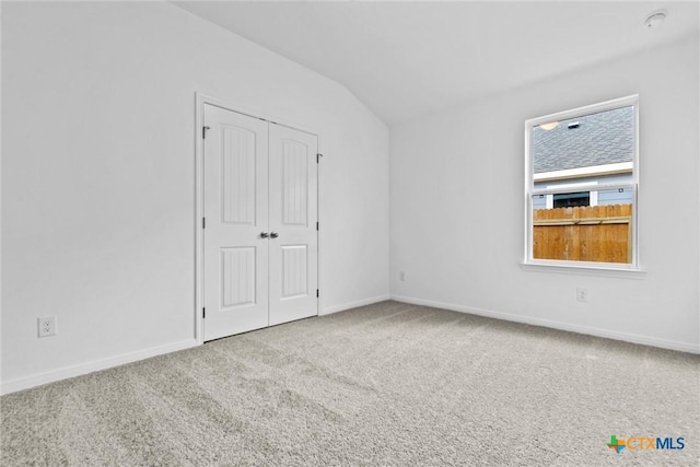 9820 Tarabon Dr, Killeen, TX 76542 - unfurnished bedroom with lofted ceiling, carpet flooring, and a closet