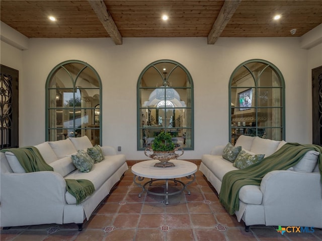 living room featuring beam ceiling and wooden ceiling