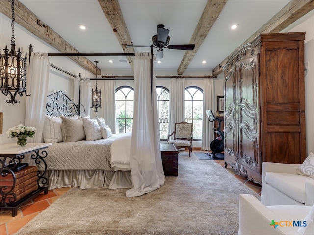 bedroom featuring beamed ceiling and ceiling fan