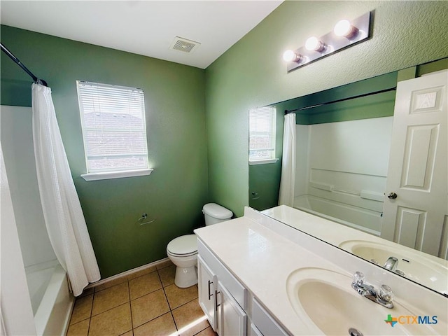 4302 Jack Barnes Ave, Killeen, TX 76549 - bathroom with shower / bathtub combination with curtain, vanity, and tile patterned floors