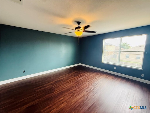 4302 Jack Barnes Ave, Killeen, TX 76549 - unfurnished room with dark wood-style flooring and a ceiling fan