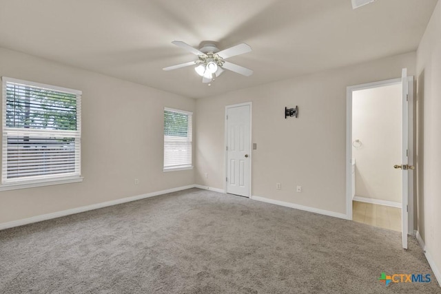 2121 Keystone Dr, New Braunfels, TX 78130 - spare room with carpet floors, healthy amount of natural light, and a ceiling fan
