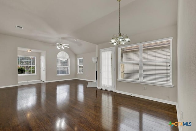 2121 Keystone Dr, New Braunfels, TX 78130 - unfurnished living room featuring lofted ceiling, a chandelier, ceiling fan, wood finished floors, and baseboards