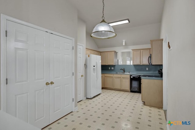 2121 Keystone Dr, New Braunfels, TX 78130 - kitchen featuring white refrigerator with ice dispenser, vaulted ceiling, black dishwasher, light brown cabinetry, and a sink