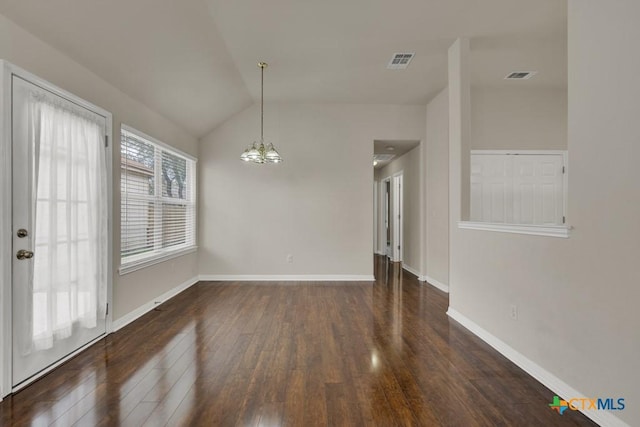 2121 Keystone Dr, New Braunfels, TX 78130 - unfurnished dining area with a chandelier, wood finished floors, lofted ceiling, and baseboards