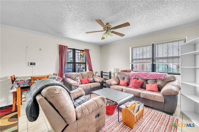 3602 Bacon Ranch Rd, Killeen, TX 76542 - living area with plenty of natural light, tile patterned floors, a ceiling fan, ornamental molding, and a textured ceiling