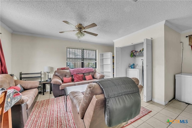 3602 Bacon Ranch Rd, Killeen, TX 76542 - living room with ceiling fan, light tile patterned floors, crown molding, washer / dryer, and a textured ceiling