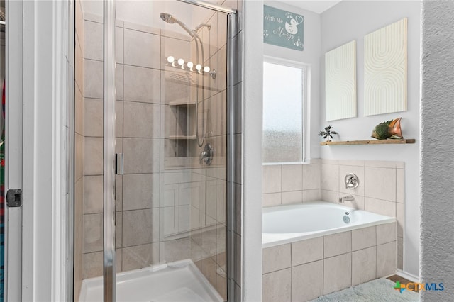 421 Perfect World Loop, Jarrell, TX 76537 - bathroom featuring a stall shower and a garden tub