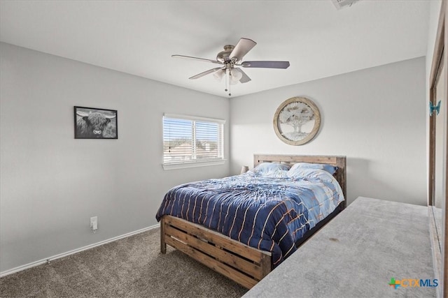 bedroom featuring baseboards, a ceiling fan, and carpet flooring