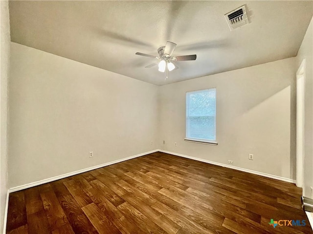 1009-1019 Advance St, San Marcos, TX 78666 - unfurnished room with baseboards, ceiling fan, visible vents, and wood finished floors
