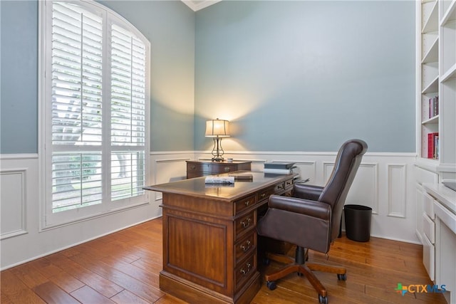 1332 Walker Cir, Salado, TX 76571 - office space featuring wainscoting, a decorative wall, and wood finished floors